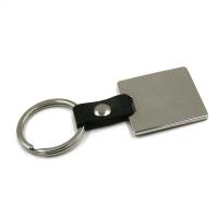 Metallic keychain with leather strap