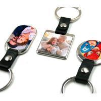 Metallic keychain with leather strap