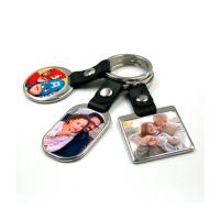 Metallic keychain with leather strap