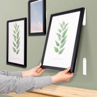 Adhesive strip for hanging pictures