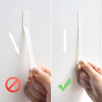 Tira adhesiva para colgar cuadros