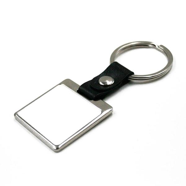 Metallic keychain with leather strap