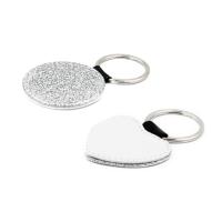 Llaveros de símil piel plateado con purpurina (varias formas)