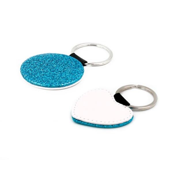 Llaveros de símil piel azul con purpurina (varias formas)