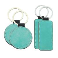 Llaveros de símil piel azul pastel (varias formas)